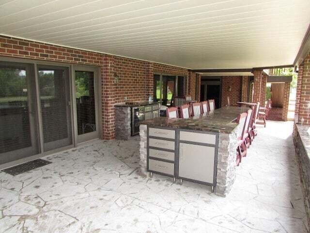 view of patio / terrace with exterior bar