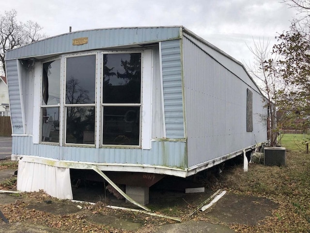 view of home's exterior featuring central air condition unit