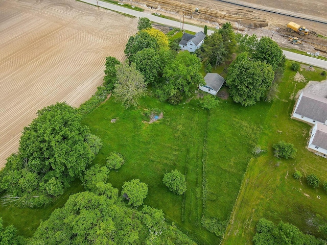 birds eye view of property featuring a rural view