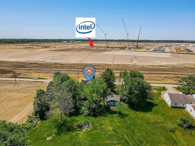 birds eye view of property featuring a rural view