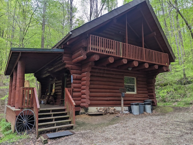 view of side of property with a deck