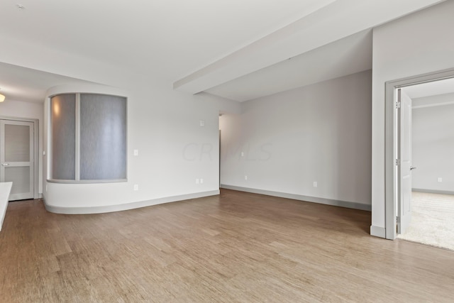 unfurnished living room featuring light wood-type flooring