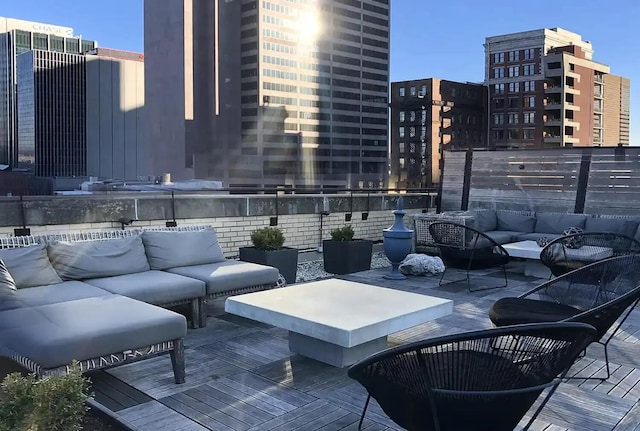 51 N High St Unit 506, Columbus, OH 43215 - view of patio / terrace featuring an outdoor hangout area, a view of city, and a wooden deck