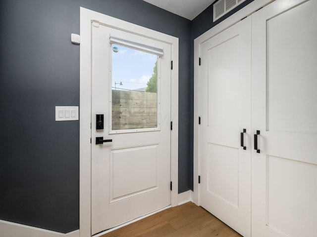 entryway featuring hardwood / wood-style flooring