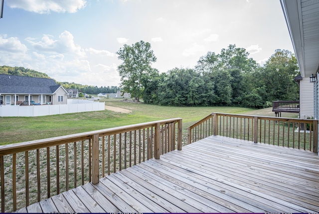 deck featuring a lawn