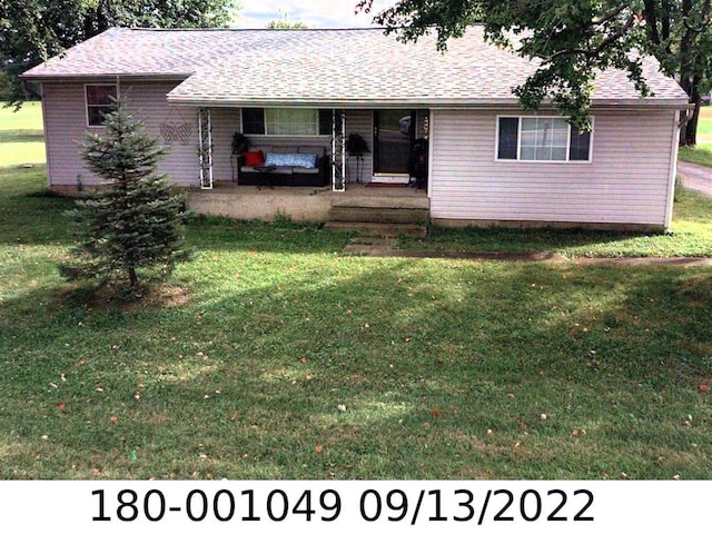 3450 Rohr Rd, Groveport, OH 43125 - ranch-style home featuring a porch and a front lawn
