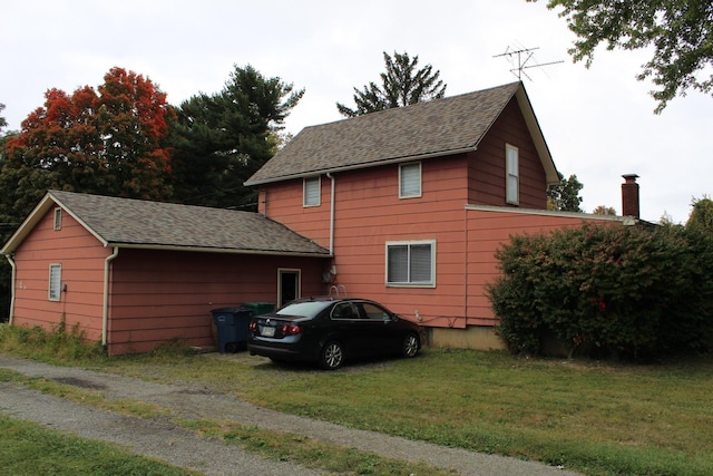 view of home's exterior featuring a yard