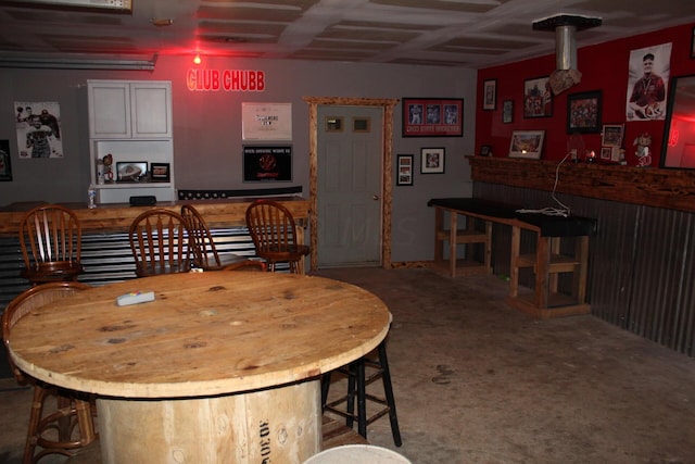 dining area featuring carpet flooring