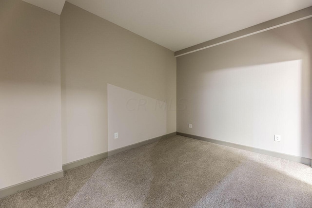 51 N High St Unit 307, Columbus, OH 43215 - spare room featuring carpet flooring and baseboards