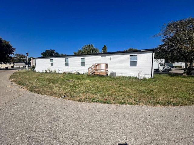 exterior space featuring a front lawn