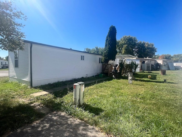 view of property exterior with a lawn