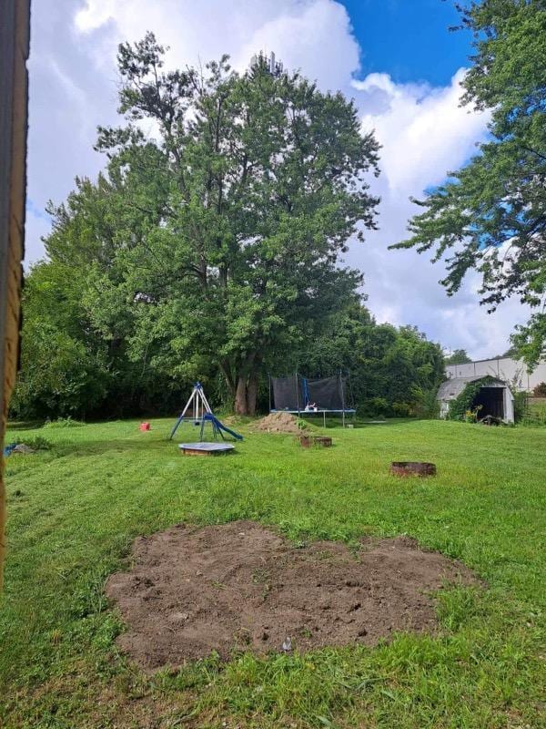 view of yard featuring a trampoline