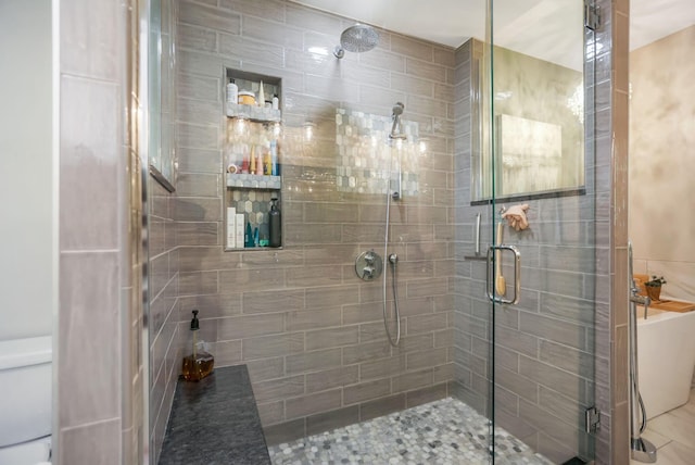 bathroom featuring tile patterned flooring and plus walk in shower