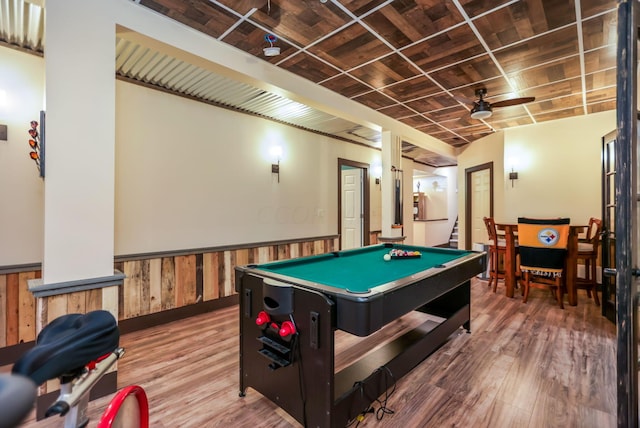 playroom featuring ceiling fan, billiards, wood walls, and hardwood / wood-style flooring