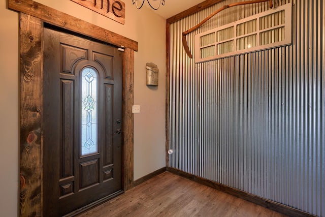 foyer entrance with hardwood / wood-style flooring