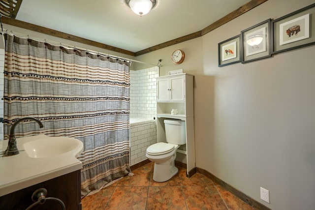 bathroom with vanity, toilet, and curtained shower