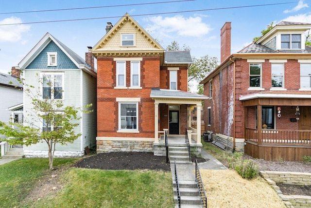 victorian-style house with covered porch