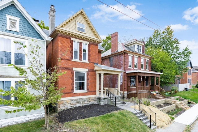 view of front of property featuring covered porch