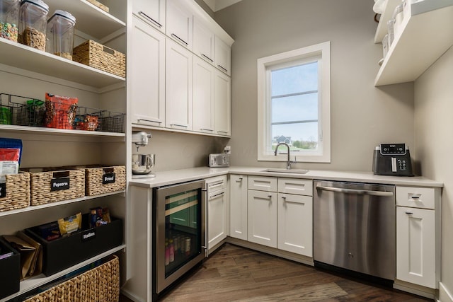 kitchen featuring dark wood-style flooring, open shelves, beverage cooler, and dishwasher