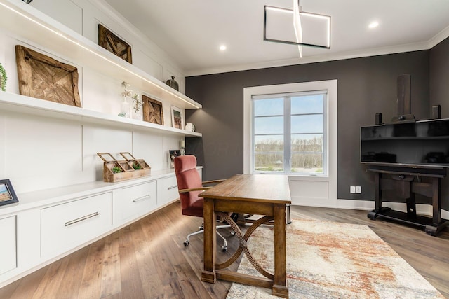 office space with recessed lighting, light wood-style floors, and crown molding
