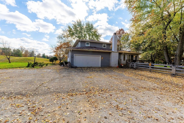 view of front of home featuring a garage