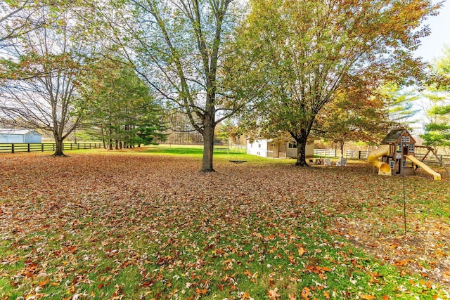 view of yard featuring a playground