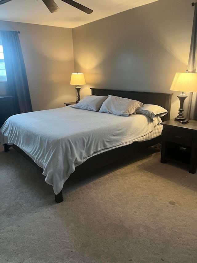 bedroom with carpet flooring and ceiling fan