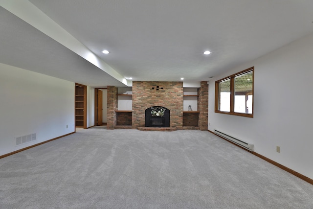 unfurnished living room featuring baseboard heating, light carpet, and a brick fireplace