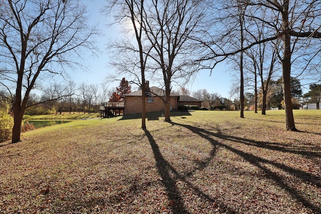 view of yard featuring a water view