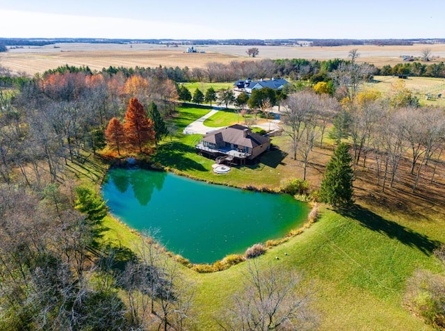 bird's eye view with a water view and a rural view