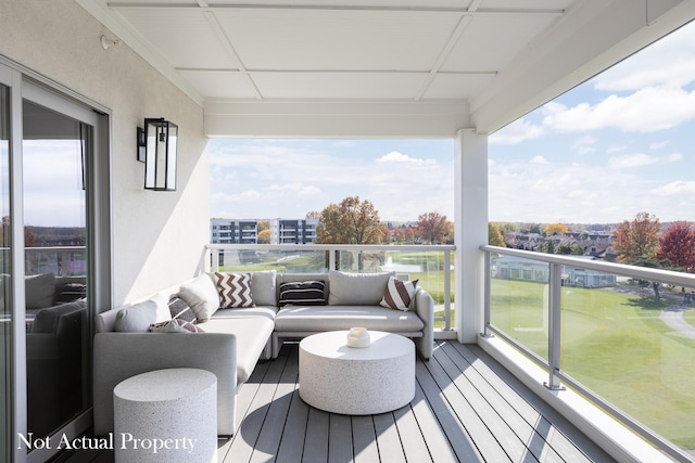 wooden deck featuring outdoor lounge area