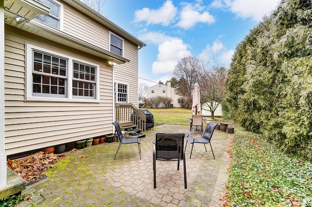 view of patio / terrace featuring a fire pit