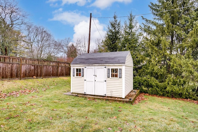 view of outdoor structure featuring a yard