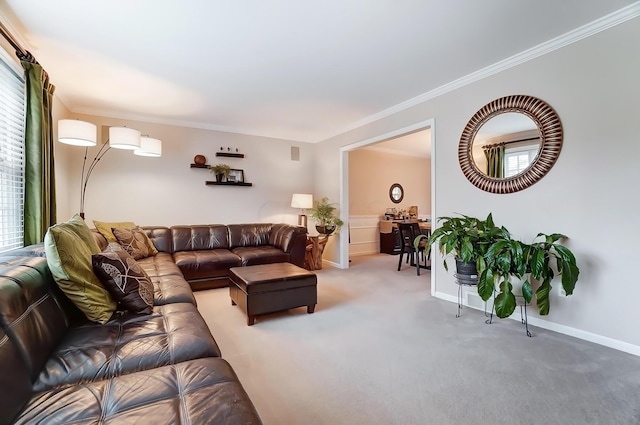 carpeted living room featuring ornamental molding