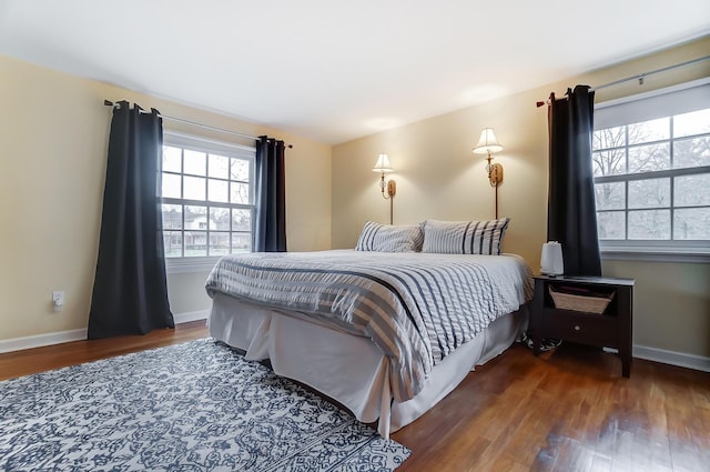 bedroom featuring dark hardwood / wood-style flooring