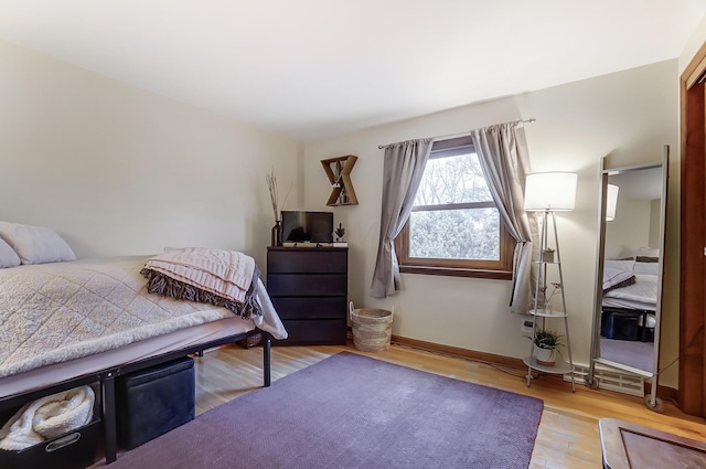 bedroom featuring light hardwood / wood-style floors