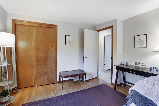 bedroom featuring wood-type flooring