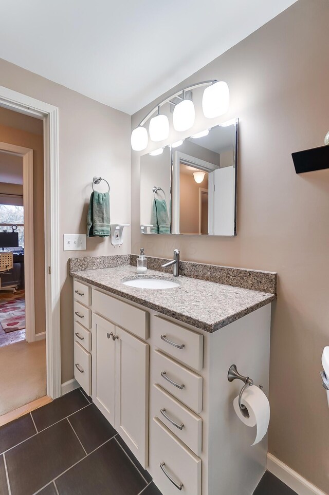 bathroom featuring vanity and tile patterned floors