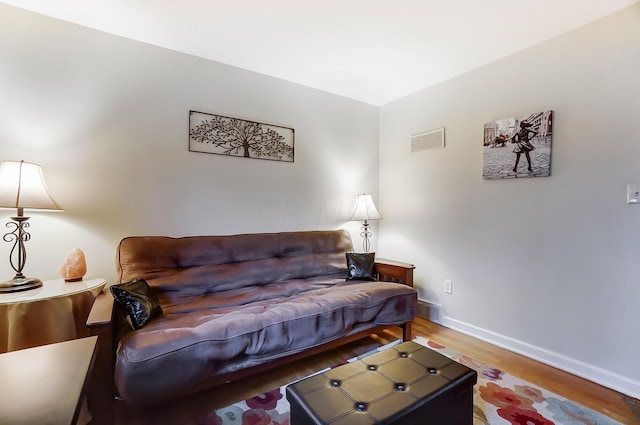 living room with hardwood / wood-style floors