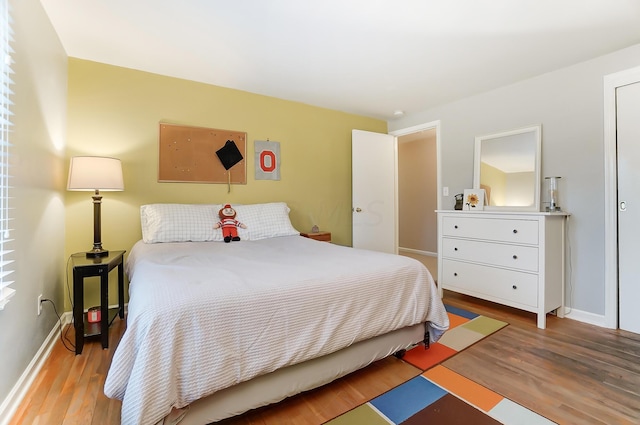 bedroom featuring light wood-type flooring