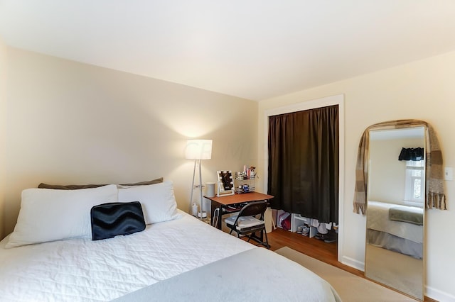 bedroom featuring hardwood / wood-style flooring