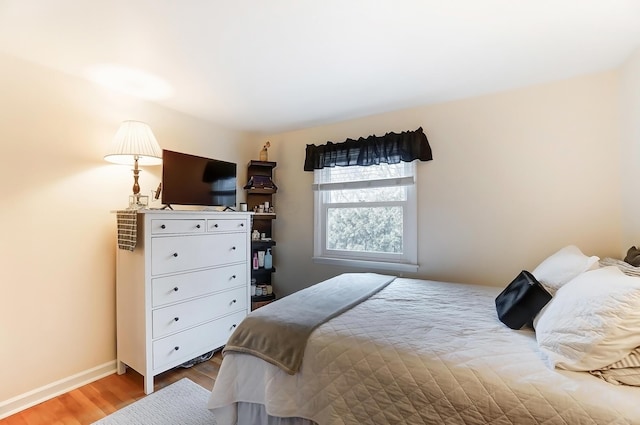 bedroom featuring hardwood / wood-style floors