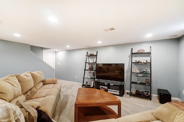 living room featuring light carpet