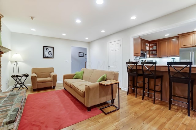 living room with light hardwood / wood-style floors