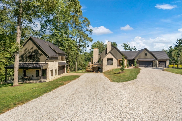 view of front facade featuring a front lawn and a garage