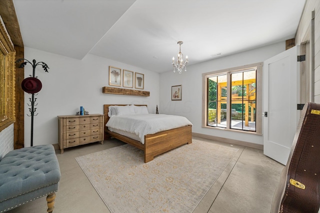 bedroom featuring a chandelier