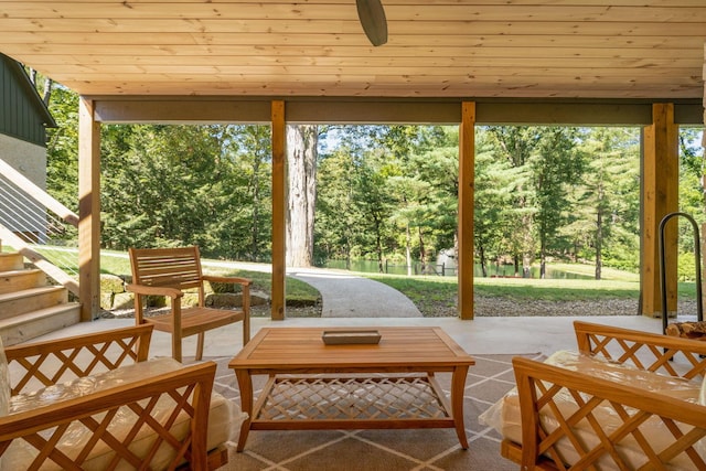 sunroom with wooden ceiling