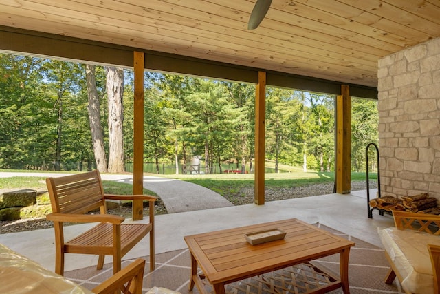 view of patio / terrace featuring ceiling fan