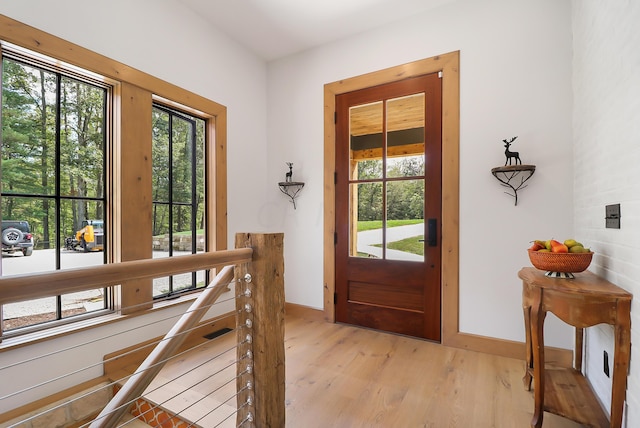 doorway to outside featuring light hardwood / wood-style floors