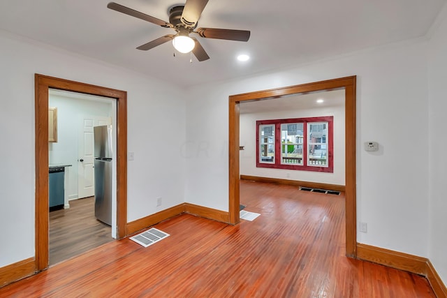 1366 Oakwood Ave, Columbus, OH 43206 - empty room featuring light wood-type flooring, a ceiling fan, recessed lighting, and ornamental molding